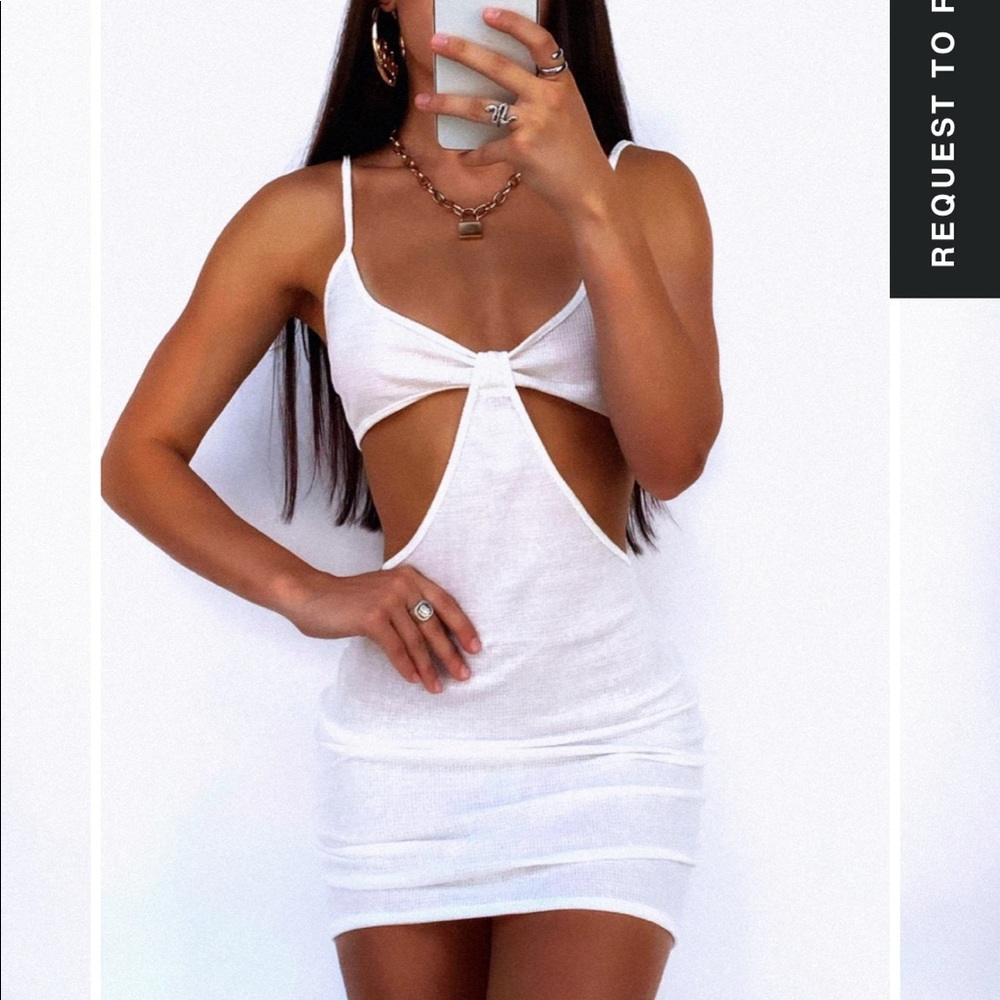 Mini white dress with cutouts